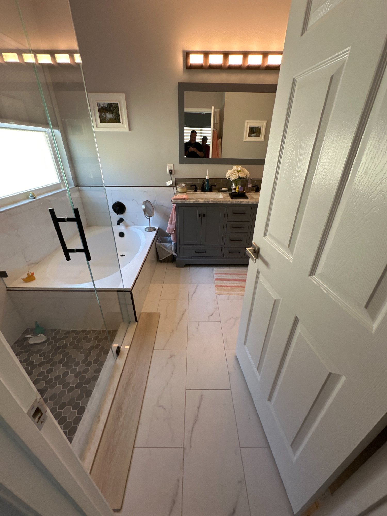 Ann's master bath before — garden tub removed, walk-in shower built